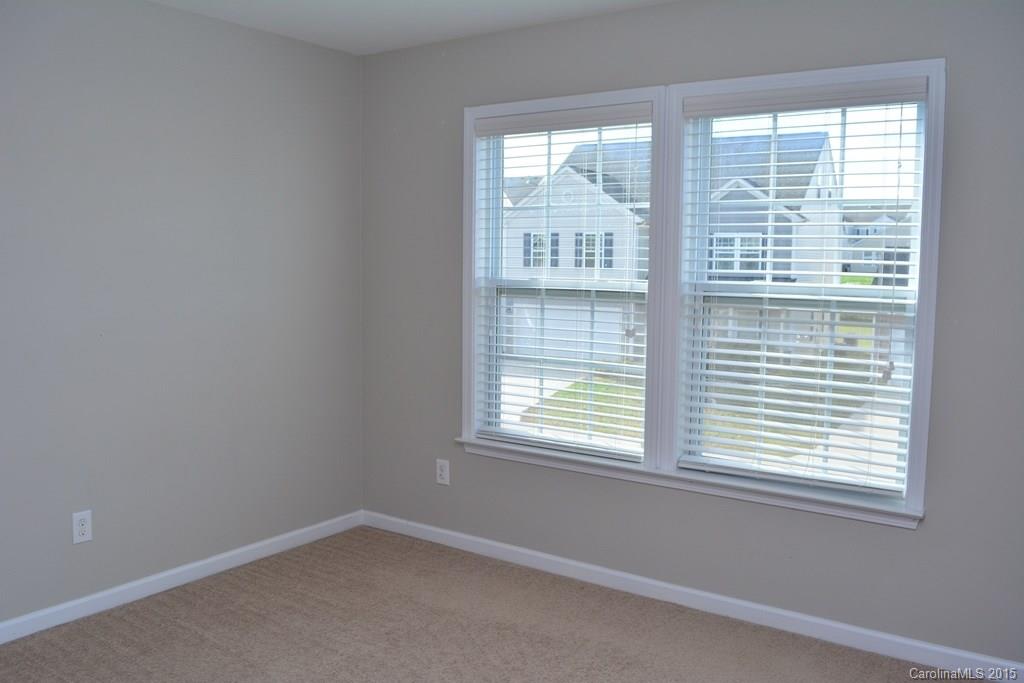 657 Shellbark Drive Concord, NC 28025 - Photo 20 of 24 a view of an empty room with a window