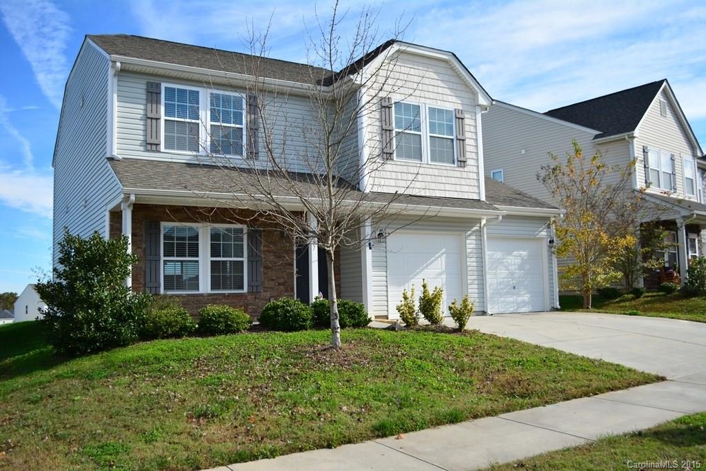657 Shellbark Drive Concord, NC 28025 - Photo 5 of 24 a front view of a house with a yard