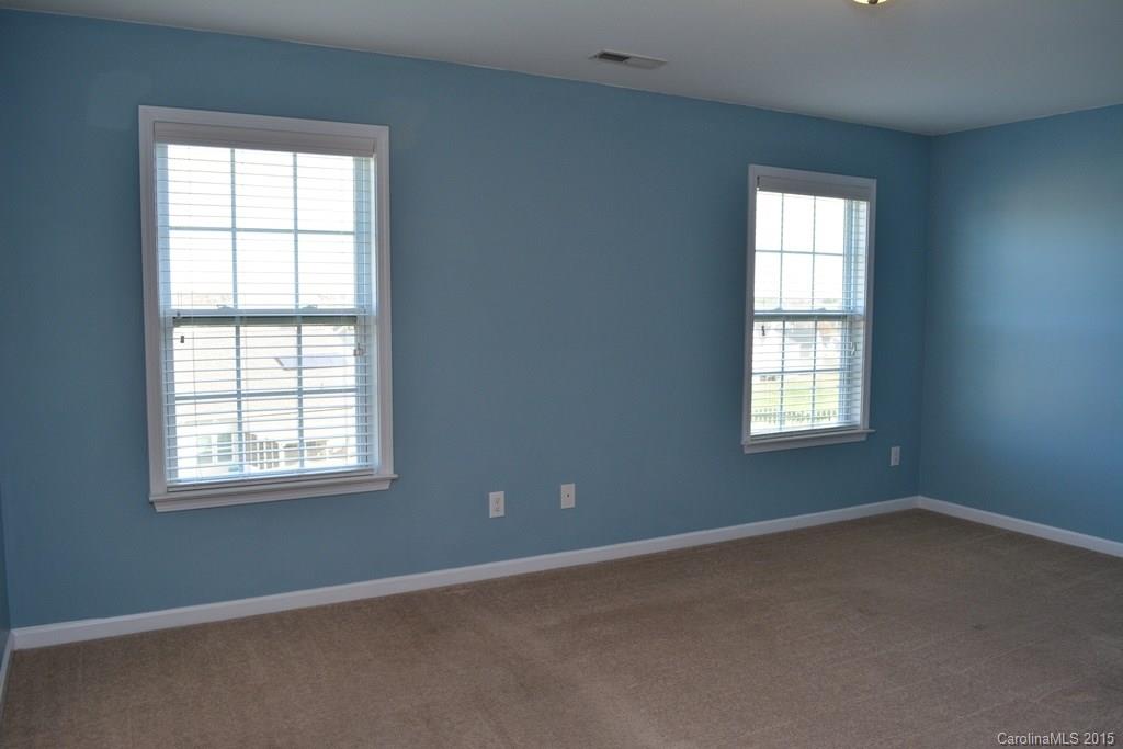 657 Shellbark Drive Concord, NC 28025 - Photo 8 of 24 an empty room with a window