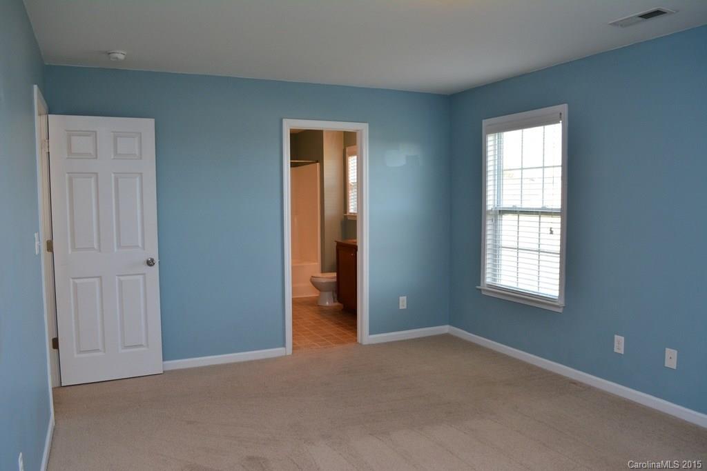 657 Shellbark Drive Concord, NC 28025 - Photo 9 of 24 an empty room that has a window