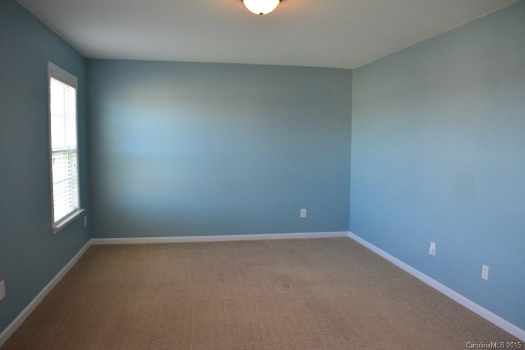 657 Shellbark Drive Concord, NC 28025 - Photo 10 of 24 an empty room with a window