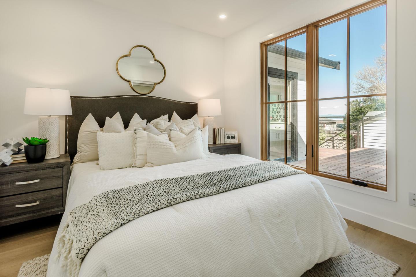 611 Bayview Avenue Millbrae, CA 94030 - Photo 16 of 34 a bedroom with a large bed and a large window