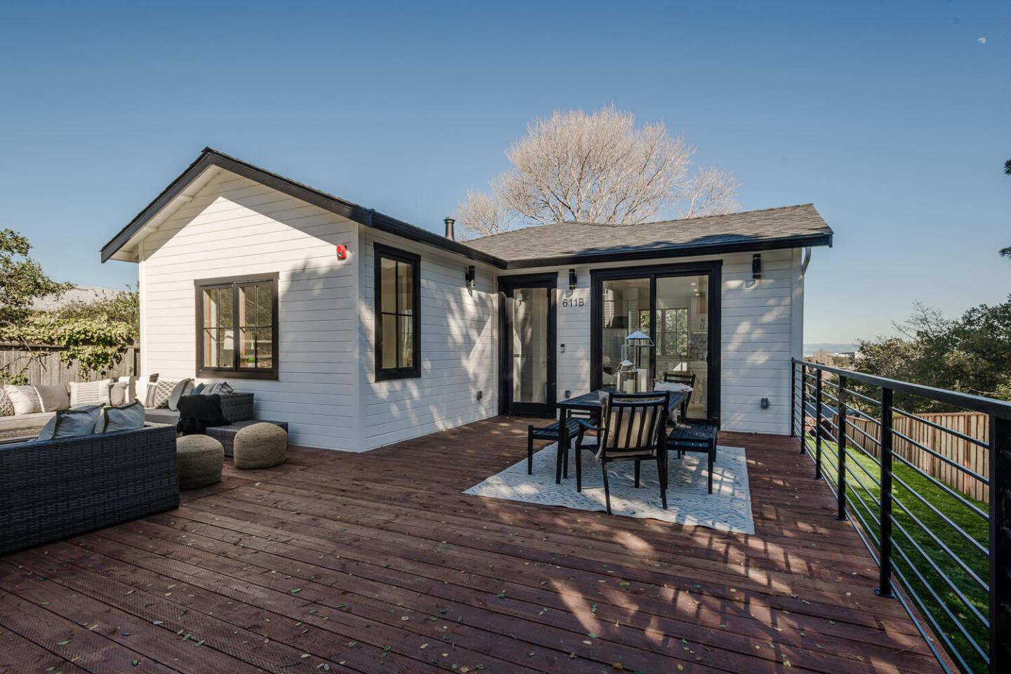 611 Bayview Avenue Millbrae, CA 94030 - Photo 21 of 34 a dining room with furniture and wooden floor