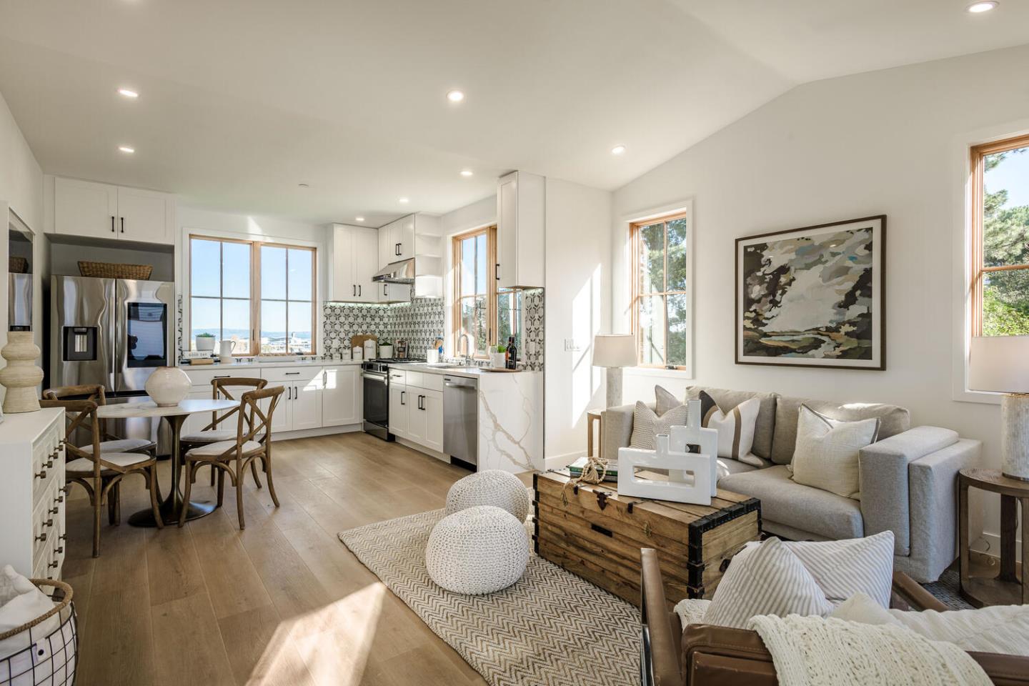611 Bayview Avenue Millbrae, CA 94030 - Photo 22 of 34 a living room with furniture kitchen and a wooden floor