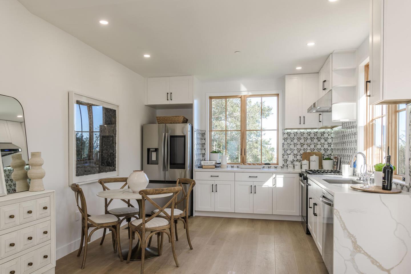 611 Bayview Avenue Millbrae, CA 94030 - Photo 24 of 34 a kitchen with stainless steel appliances kitchen island granite countertop a sink and cabinets