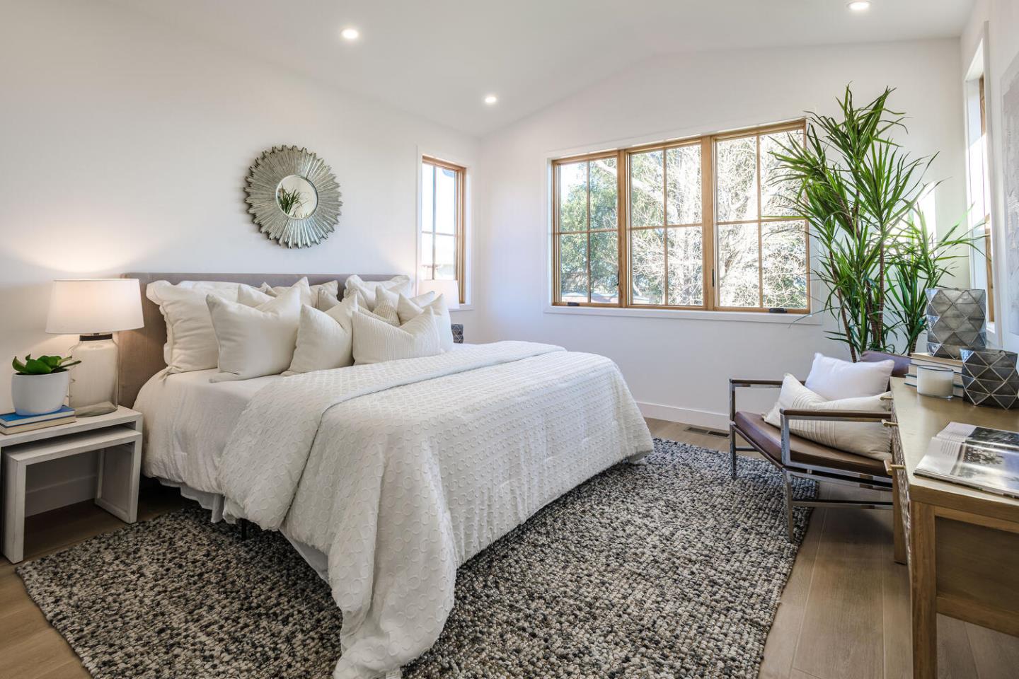 611 Bayview Avenue Millbrae, CA 94030 - Photo 28 of 34 a bed room with a bed and a chair