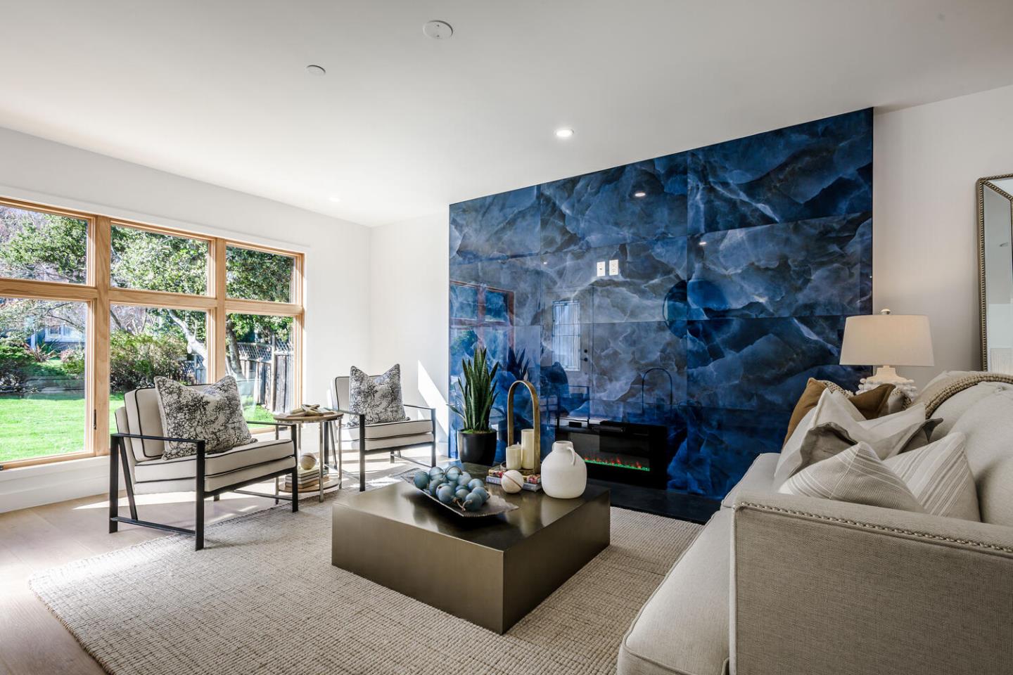 611 Bayview Avenue Millbrae, CA 94030 - Photo 6 of 34 a living room with furniture and a fireplace