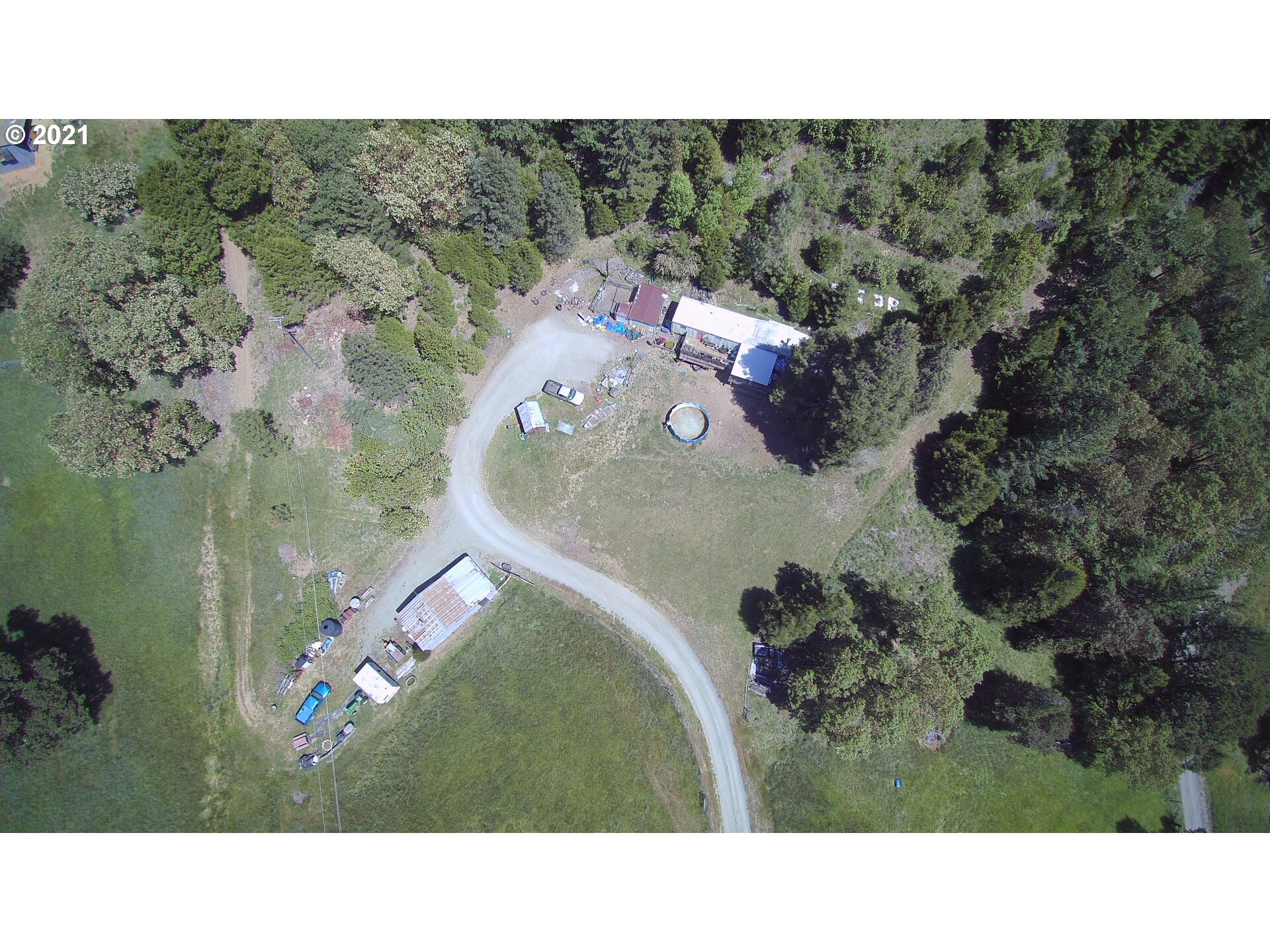 1827 Spring Brook Road Myrtle Creek, OR 97457 - Photo 4 of 15 a upper view of a house