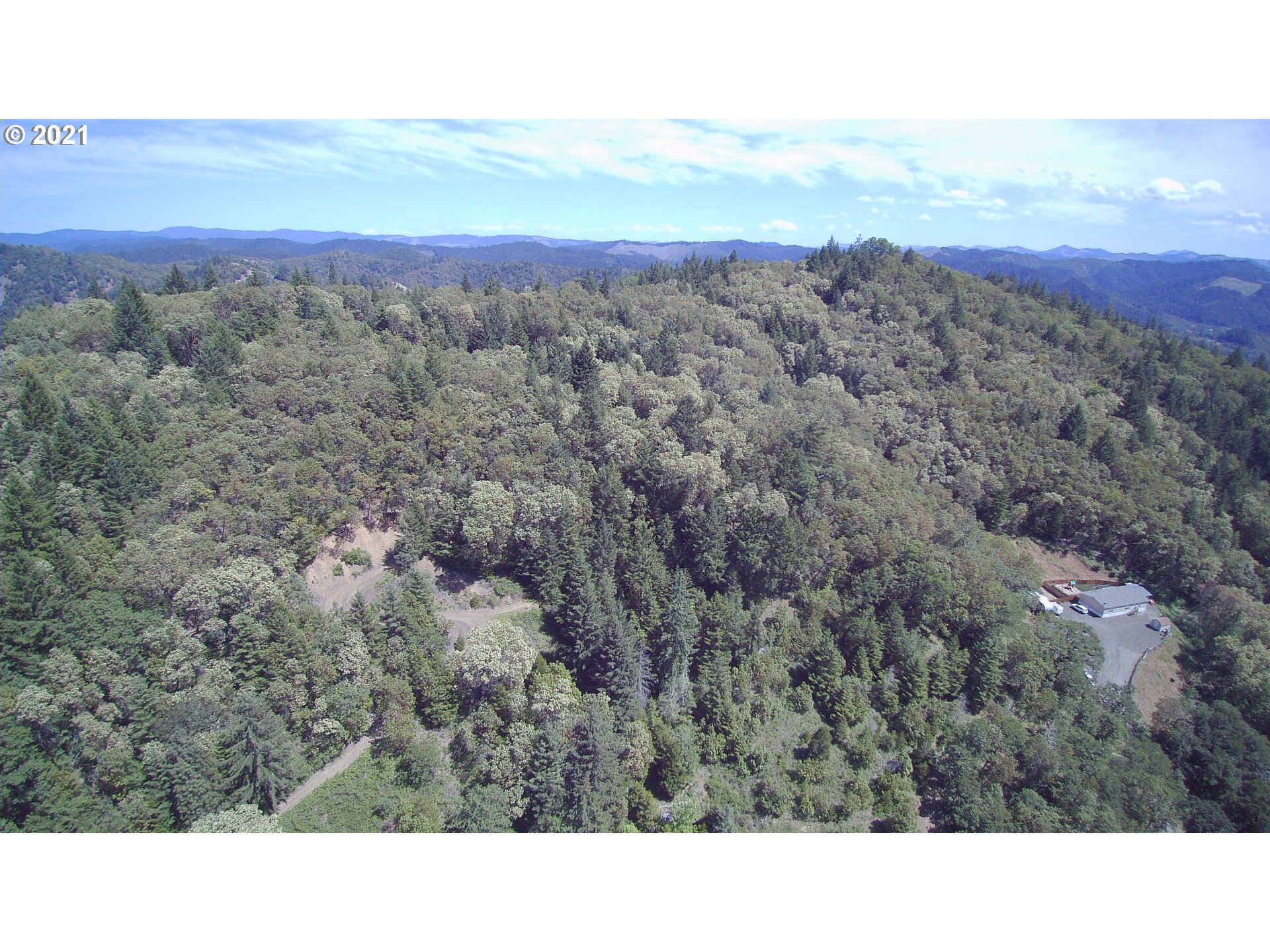 1827 Spring Brook Road Myrtle Creek, OR 97457 - Photo 6 of 15 a view of city and mountain