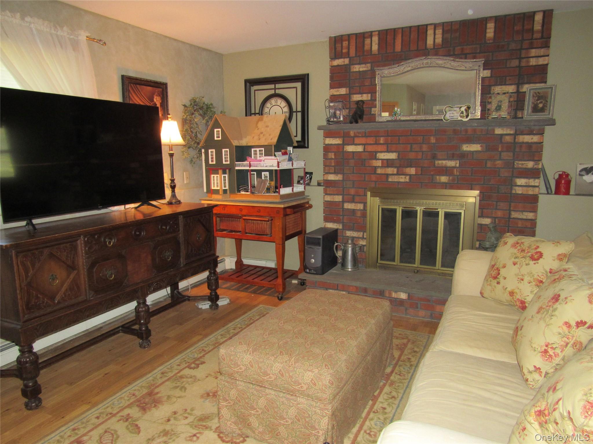 5 Hillside Road Slate Hill, NY 10973 - Photo 13 of 22 Family Rm with a Nice Brick Fireplace