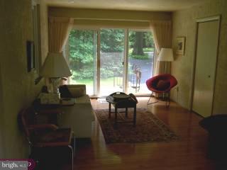 238 Upper Gulph Road Radnor, PA 19087 - Photo 3 of 6 a living room with furniture and a large window