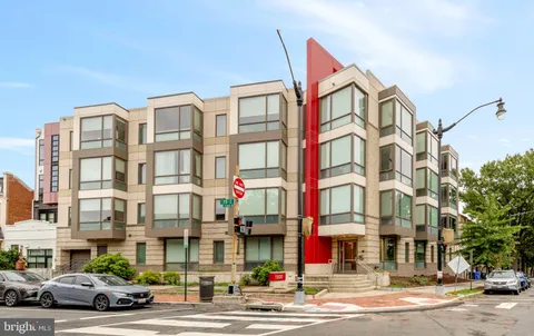 a view of a building and a street