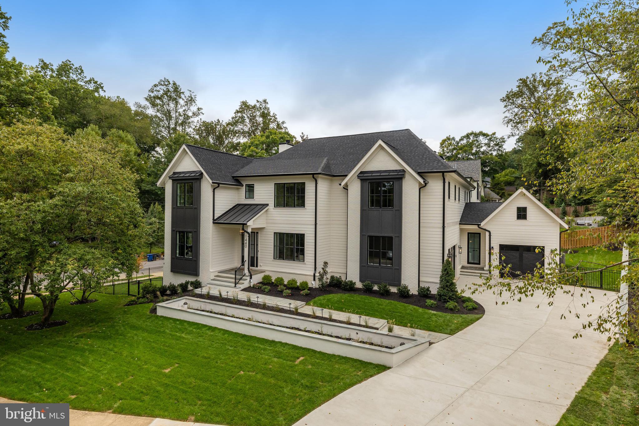 1440 Ironwood Drive McLean, VA 22101 - Photo 5 of 64 a front view of a house with a yard