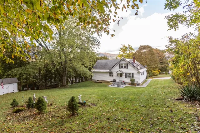 a view of backyard of a house