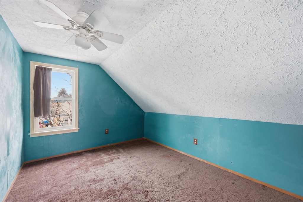 56 Percy Street Chicopee, MA 01020 - Photo 32 of 42 a view of an empty room with a window
