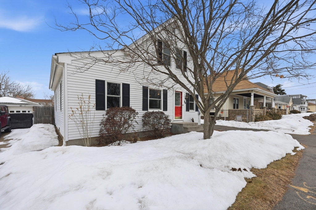 56 Percy Street Chicopee, MA 01020 - Photo 4 of 42 a view of a house with a snow in a yard