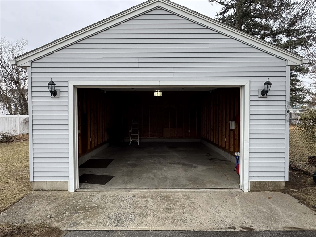56 Percy Street Chicopee, MA 01020 - Photo 42 of 42 a front view of a white house