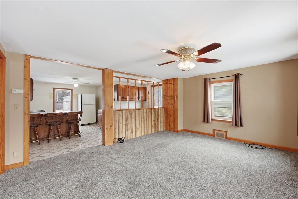 56 Percy Street Chicopee, MA 01020 - Photo 8 of 42 a view of livingroom with furniture ceiling fan and window