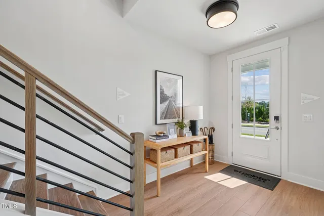 a front view of a house with garage