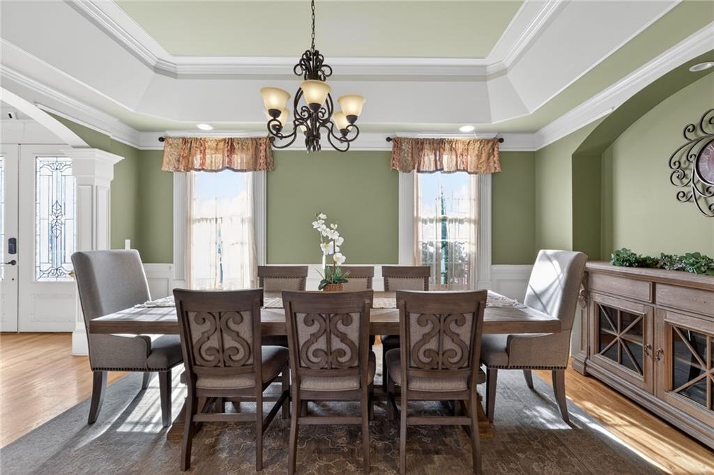 121 Carson Place Carrollton, GA 30117 - Photo 7 of 43 a view of a dining room with furniture window and wooden floor
