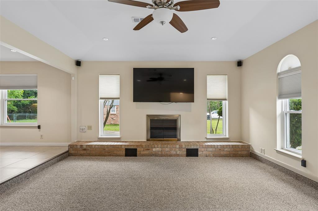 1548 Timbercreek Drive Howe, TX 75459 - Photo 4 of 24 a living room with furniture and a fireplace