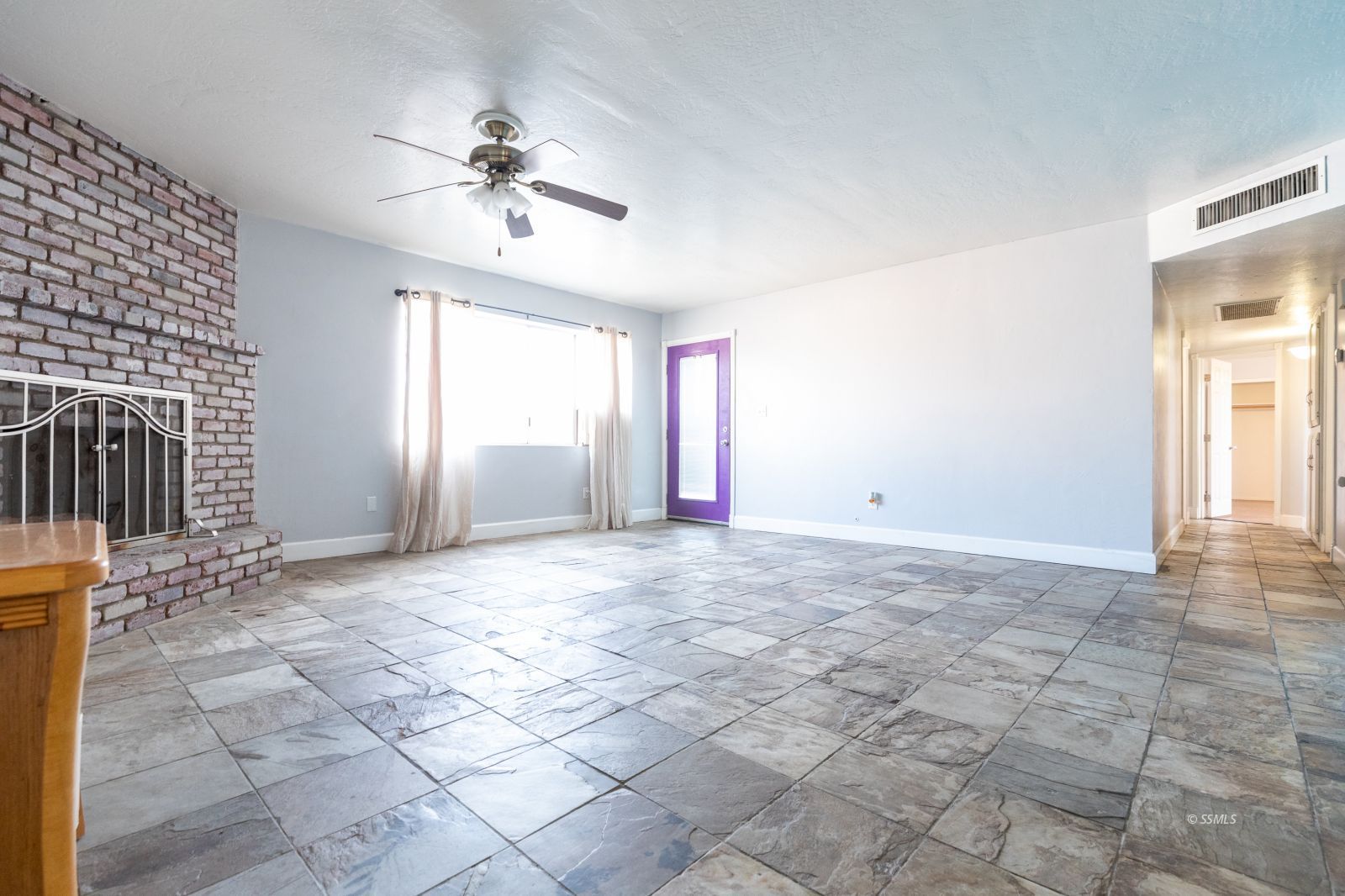 333 West Perdew Avenue Ridgecrest, CA 93555 - Photo 9 of 29 a view of a livingroom with a ceiling fan and window