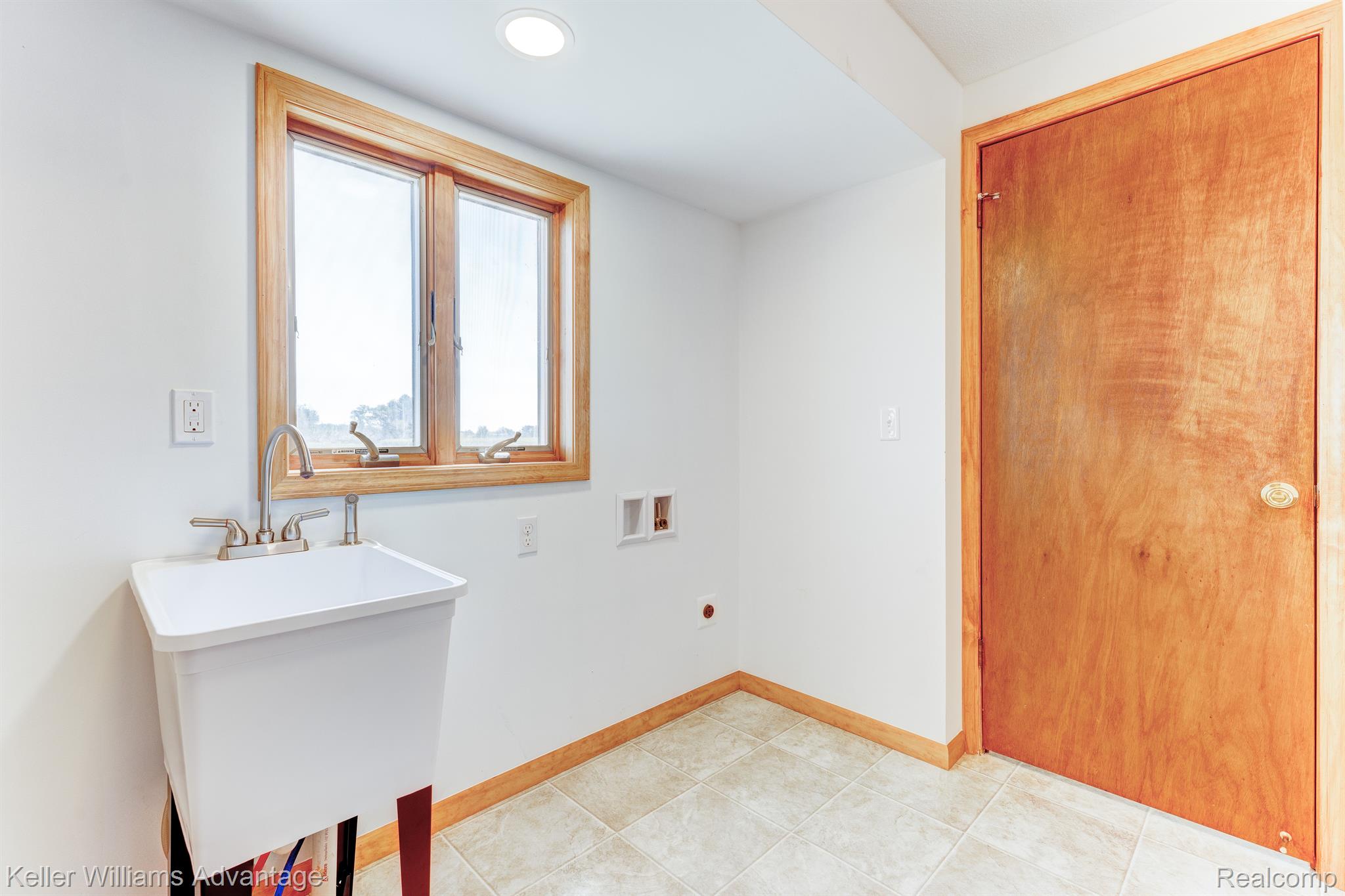 1014 Lathrop Road Allenton, MI 48002 - Photo 20 of 28 Laundry Hookup in primary bathroom