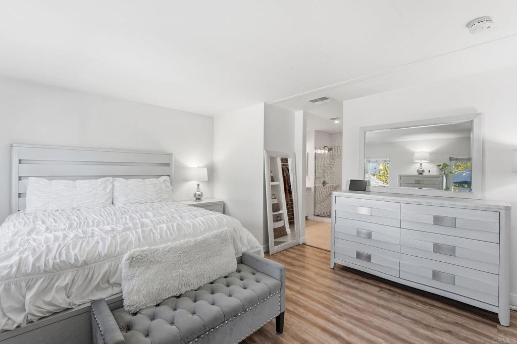 1195 La Moree Road, Unit 98 San Marcos, CA 92078 - Photo 11 of 28 a bedroom with a bed and a dresser in it