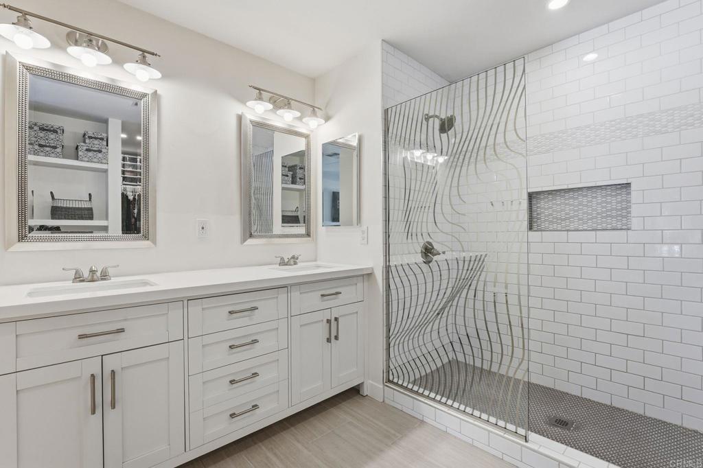 1195 La Moree Road, Unit 98 San Marcos, CA 92078 - Photo 13 of 28 a bathroom with a double vanity sink mirror and double