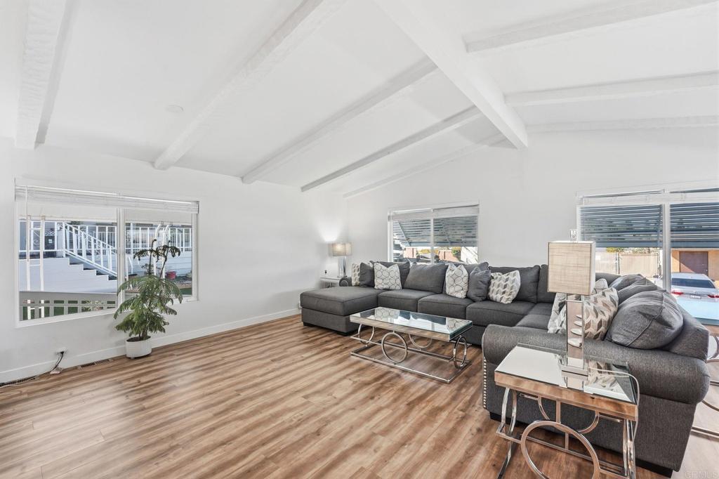 1195 La Moree Road, Unit 98 San Marcos, CA 92078 - Photo 16 of 28 a living room with furniture and a wooden floor