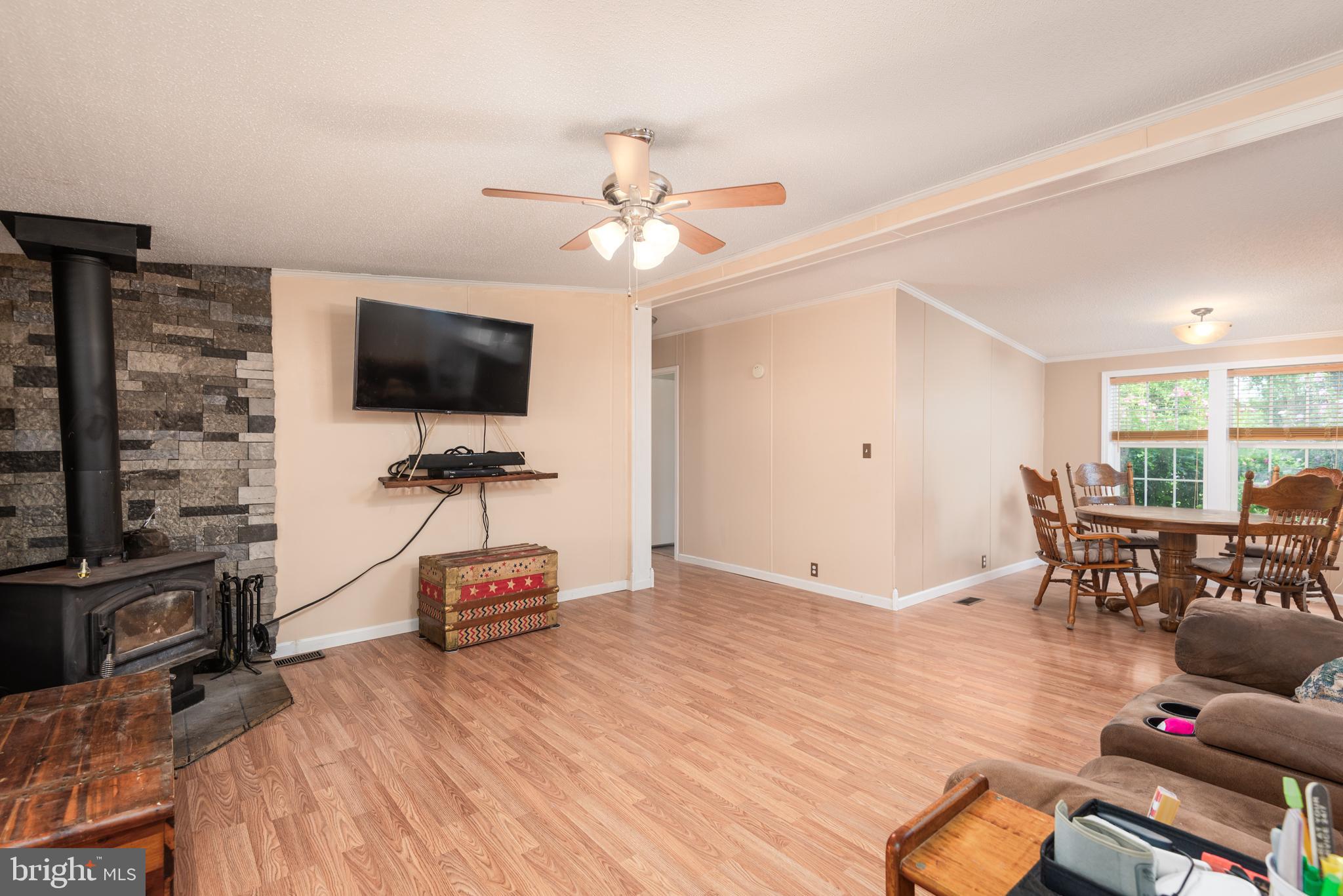 146 Bear Pond Road Marydel, MD 21649 - Photo 9 of 29 a living room with furniture and a flat screen tv