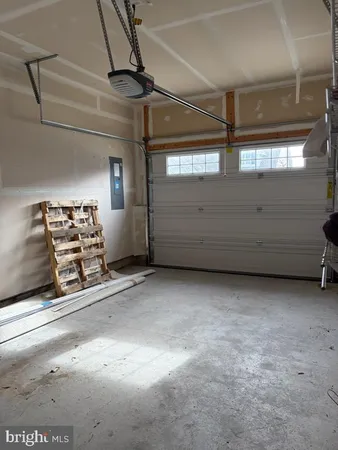 a view of a patio with chair and tables