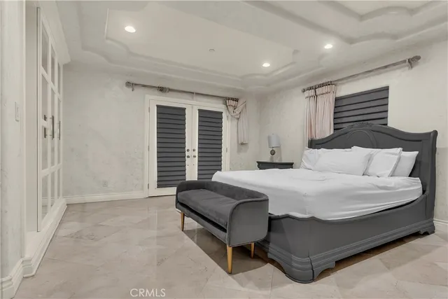 a bathroom with a shower and a sink