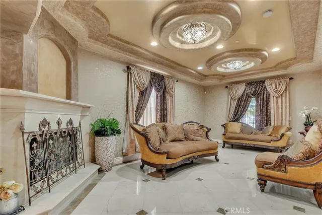 a living room with furniture and a fireplace