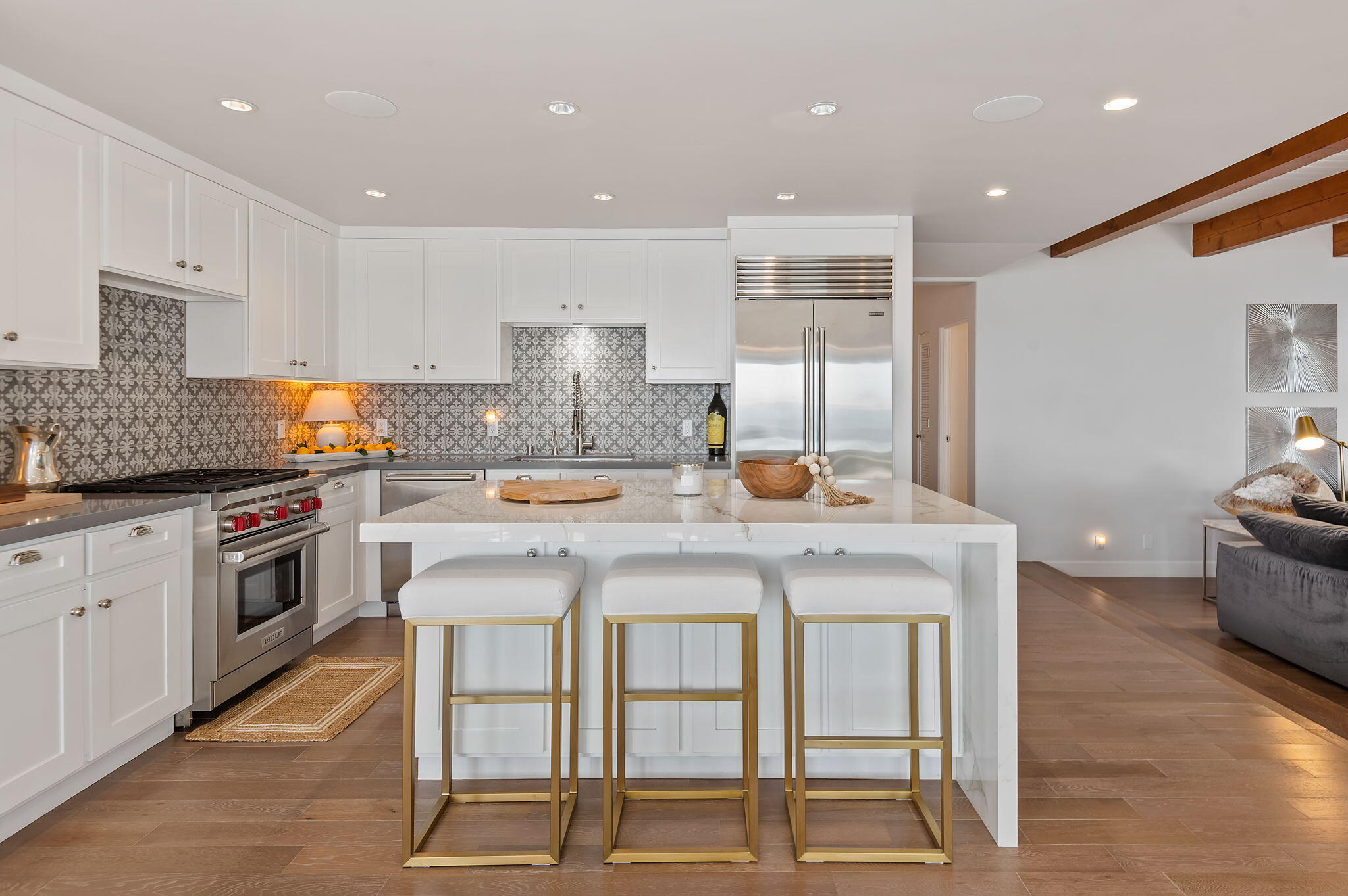 1409 Shoreline Drive Santa Barbara, CA 93109 - Photo 18 of 37 a kitchen with a table chairs stove and cabinets