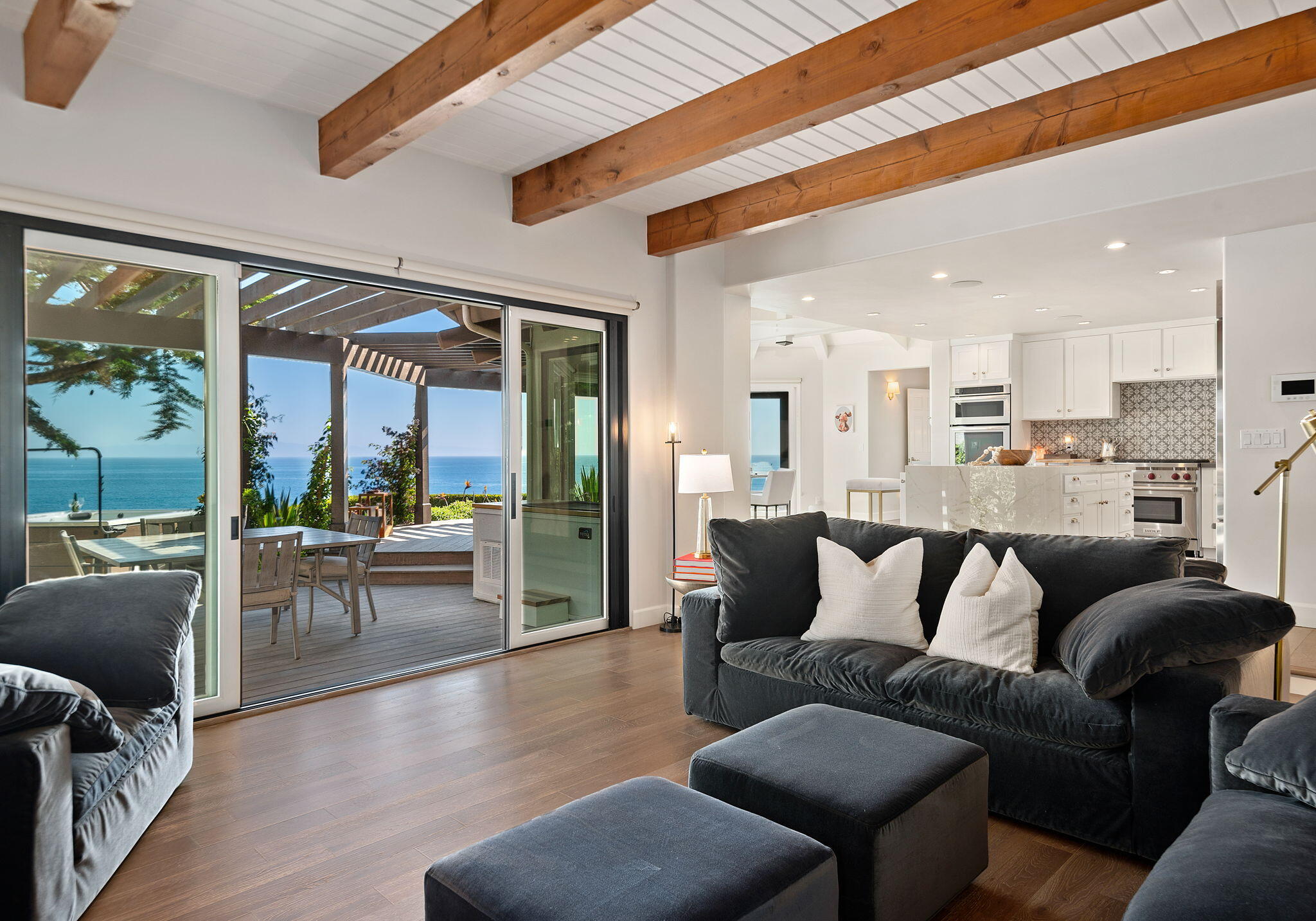1409 Shoreline Drive Santa Barbara, CA 93109 - Photo 19 of 37 a living room with furniture and a large window