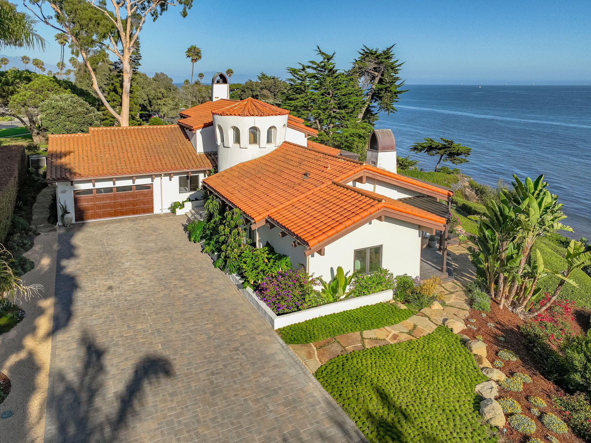 1409 Shoreline Drive Santa Barbara, CA 93109 - Photo 2 of 37 an aerial view of a house with a yard