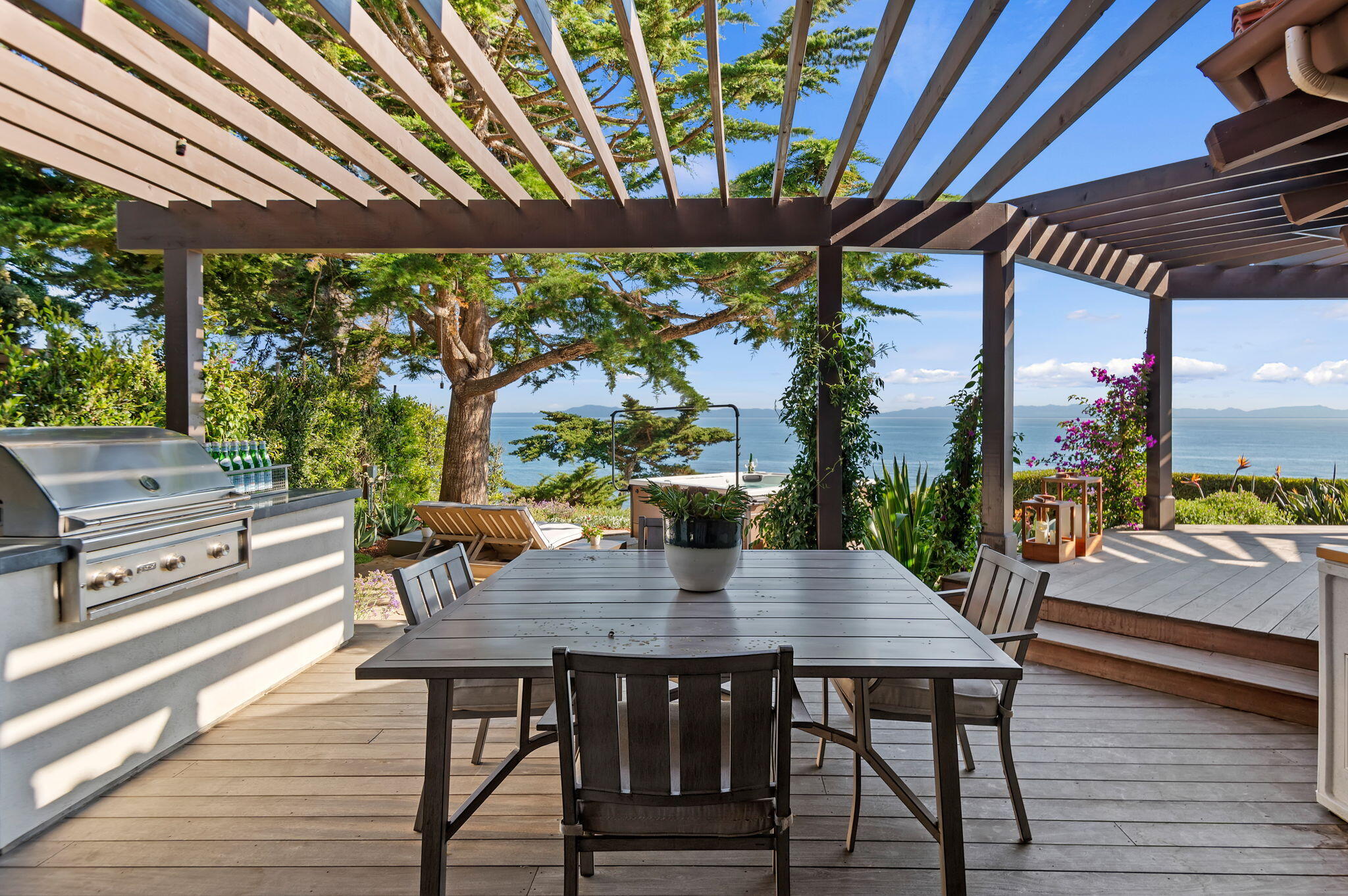 1409 Shoreline Drive Santa Barbara, CA 93109 - Photo 29 of 37 a outdoor dining space with furniture and wooden floor