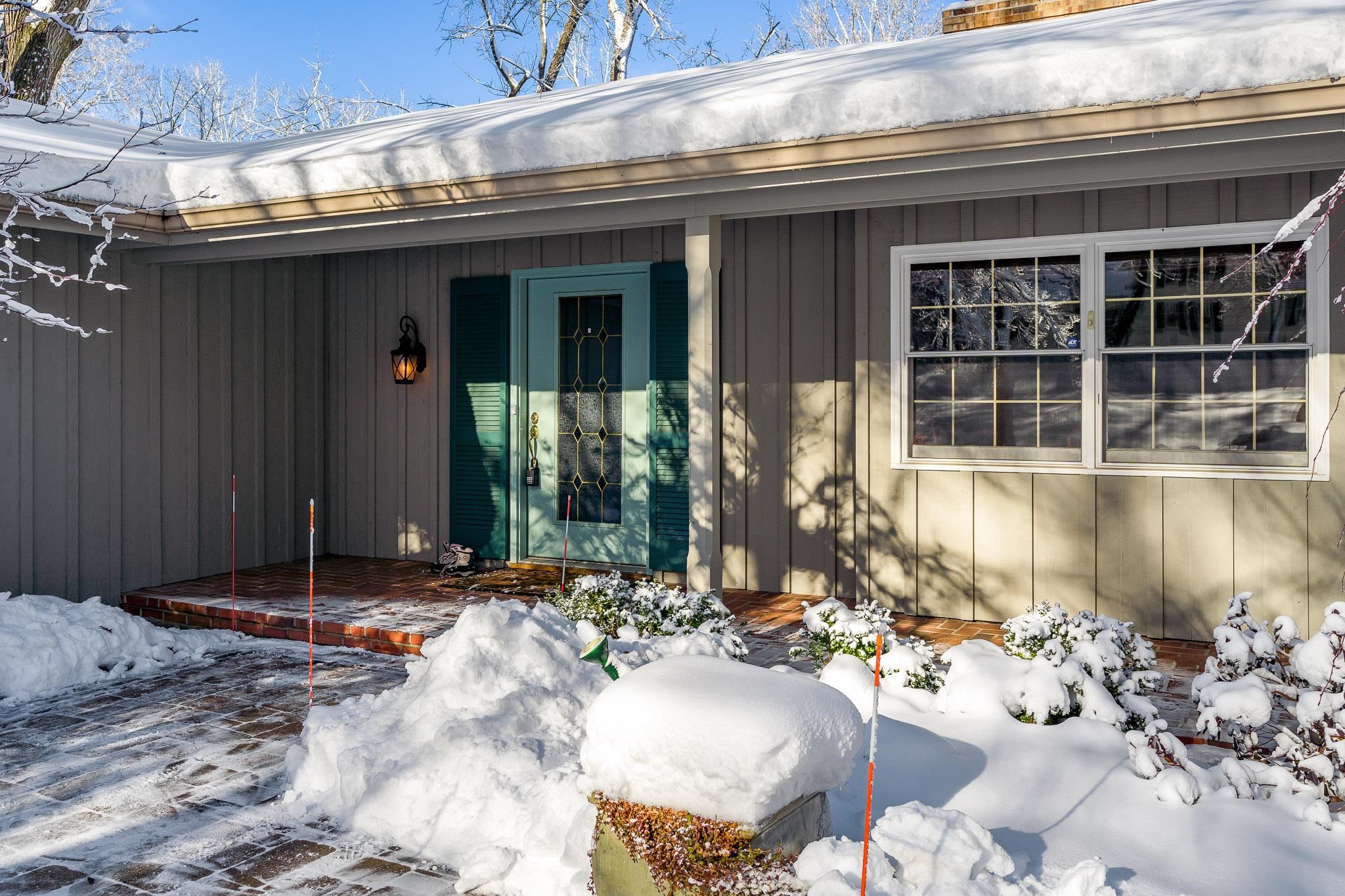 4702 Spring Brook Road Rockford, IL 61114 - Photo 6 of 70 a view of a house with a patio