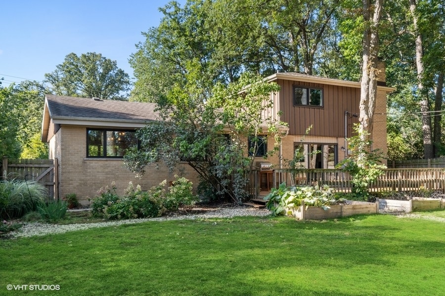 1691 Berkeley Road Highland Park, IL 60035 - Photo 21 of 25 a view of a house with a backyard