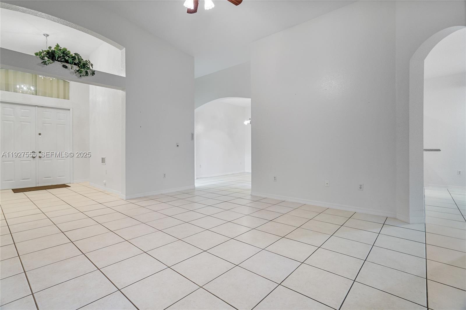 13148 Southwest 23rd Street Miramar, FL 33027 - Photo 17 of 24 an empty room with natural light