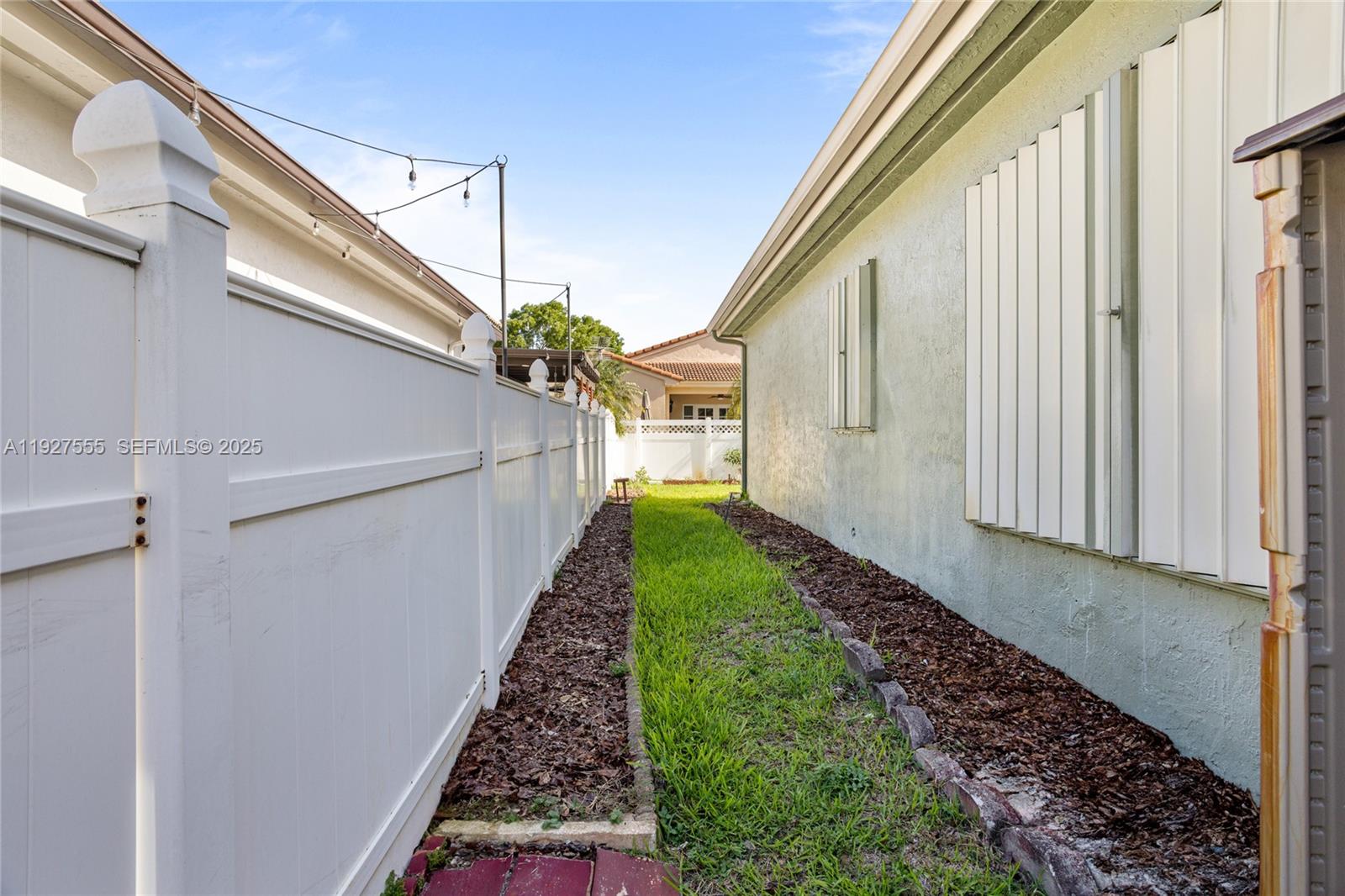 13148 Southwest 23rd Street Miramar, FL 33027 - Photo 24 of 24 a view of back yard of a house