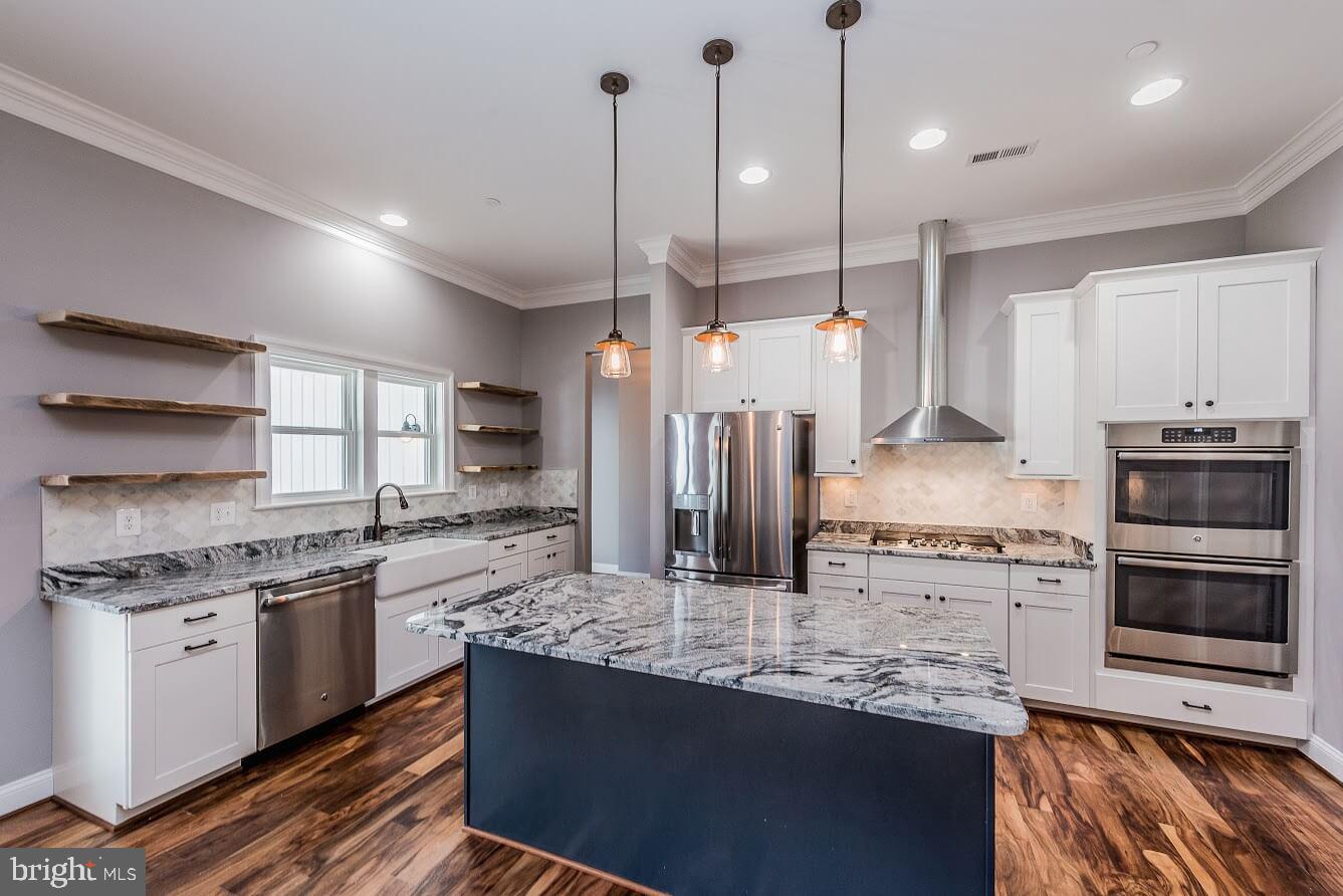 4625 Hardesty Road Huntingtown, MD 20639 - Photo 4 of 12 Kitchen layout with custom shelves