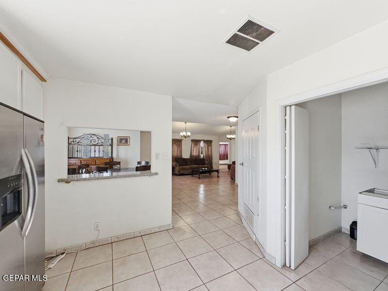 445 Suzi Way Socorro, TX 79927 - Photo 18 of 35 a view of a kitchen and a sink