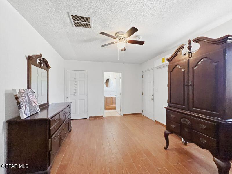 445 Suzi Way Socorro, TX 79927 - Photo 28 of 35 a view of a livingroom with furniture and hardwood floor