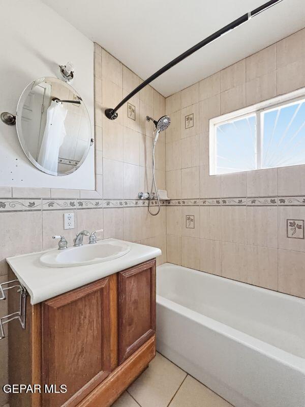 445 Suzi Way Socorro, TX 79927 - Photo 32 of 35 a bathroom with a sink vanity tub shower and a mirror