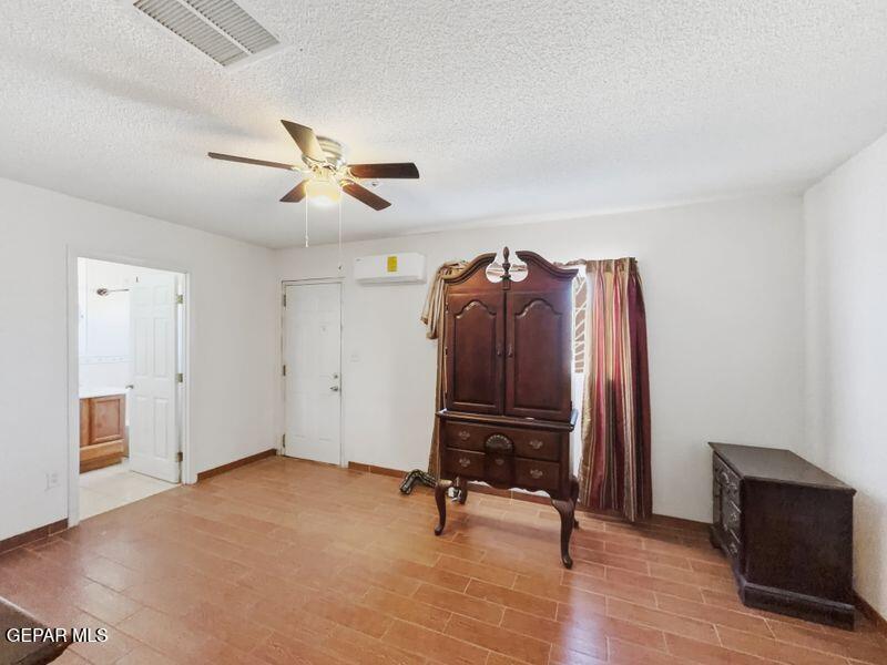 445 Suzi Way Socorro, TX 79927 - Photo 33 of 35 a view of a livingroom with furniture and a ceiling fan