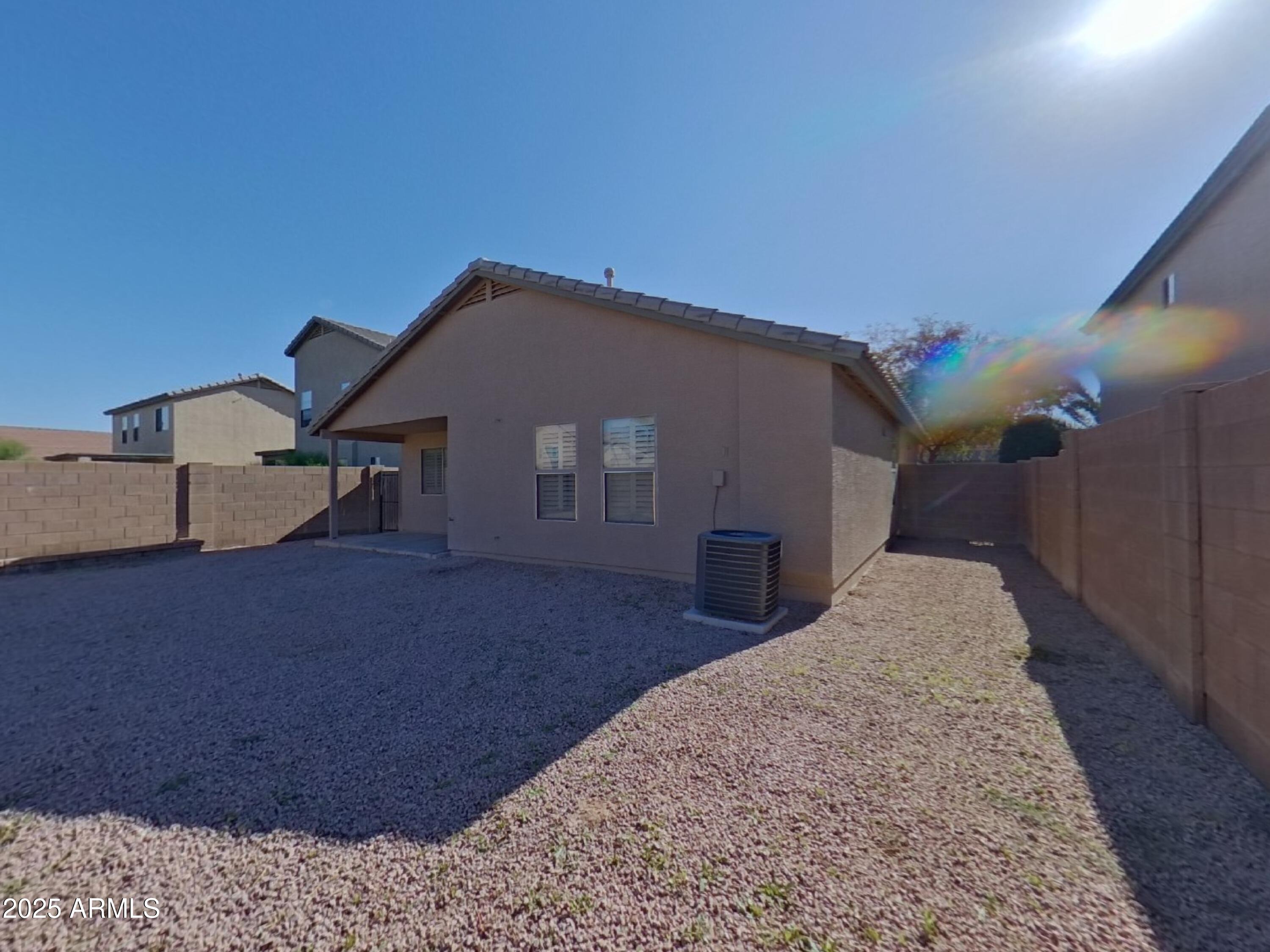 42396 Colby Drive Maricopa, AZ 85138 - Photo 16 of 17 a view of backyard of house
