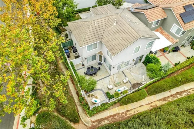 a view of a house with wooden fence
