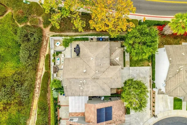 front view of a house with a plants